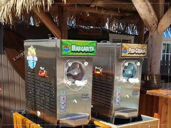Serve frozen margaritas, daquiris or any two flavors you like renting these two frozen drink machines from Island Time Party Rentals.